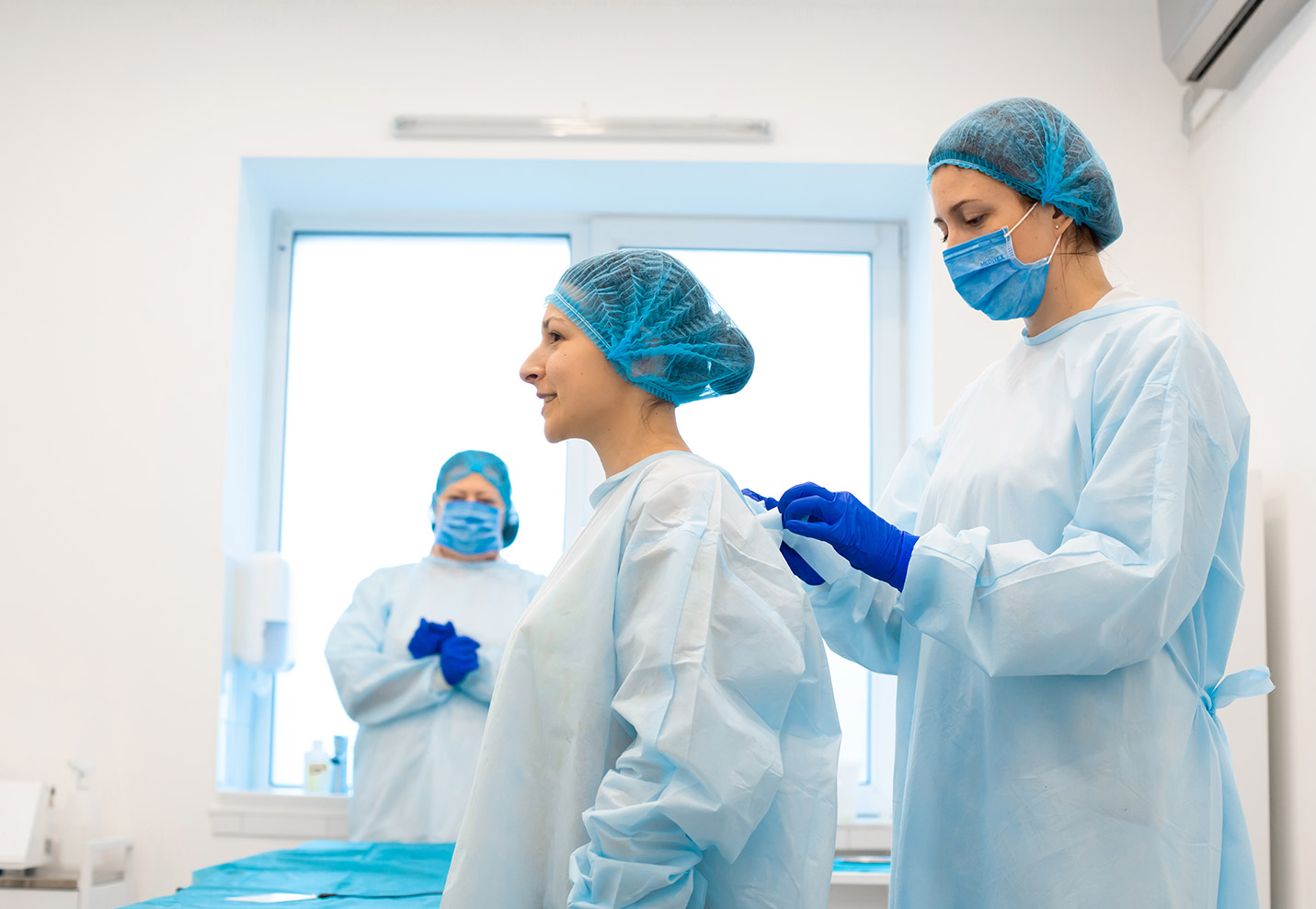 two doctors getting prepared for surgery